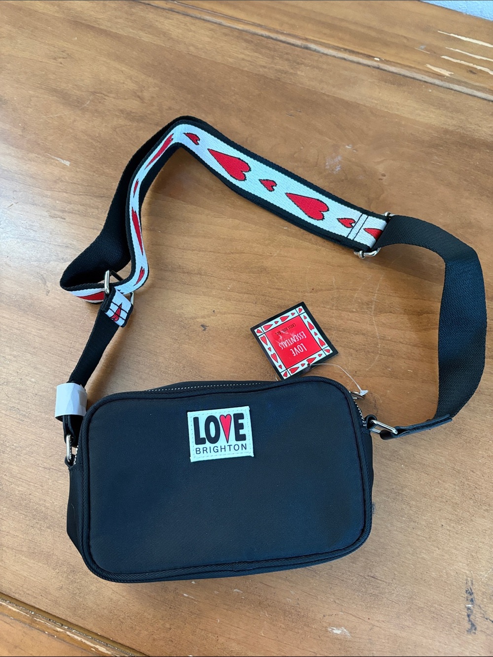Brighton NWT Live Essentials Black Crossbody Belt Bag with Heart-Print Strap